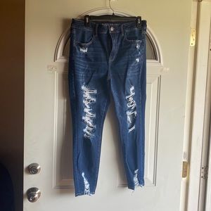 NWOT AE super stretch destroyed jeans. Size 14 short